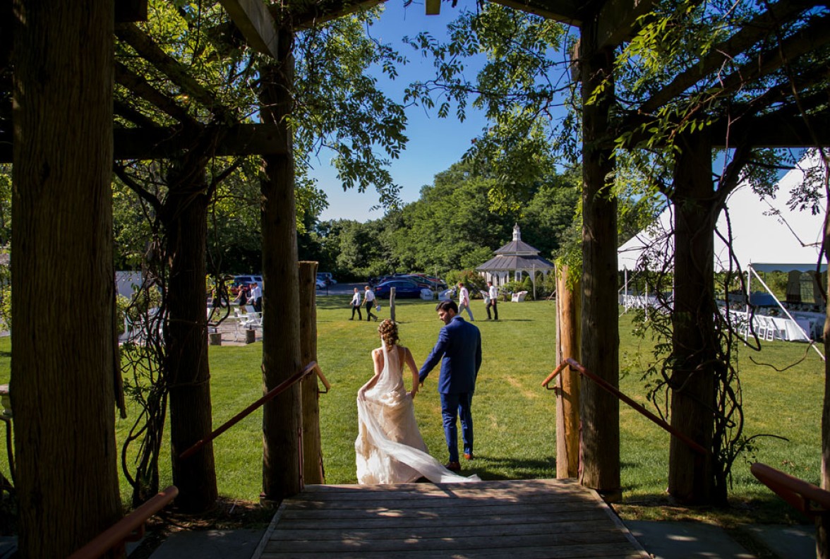 Bride and groom strolling in the gardens, Lisa Nicolosi photography